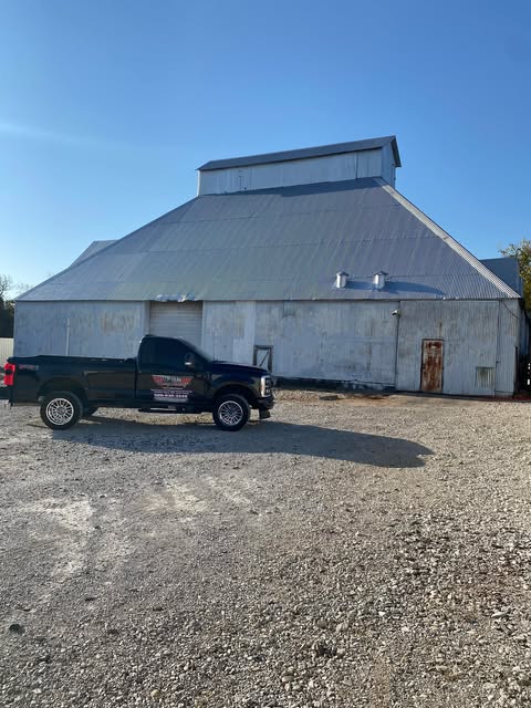 In Ardmore, OK black truck next to finished project | Top Gun Spraypainting and Coatings